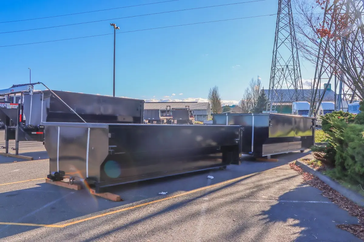 Roll-off dumpster ready for waste disposal at job site for 12 Yard Dumpster Rental in Monticello